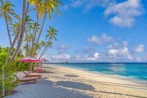 Fototapeta Naklejka Na Ścianę i Meble -  Beautiful panoramic sea sand sky. Tropical relax beach sunny summer island landscape. Love couple chairs umbrella palm leaves romantic coast. Luxury travel destination. Honeymoon vacation best tourism