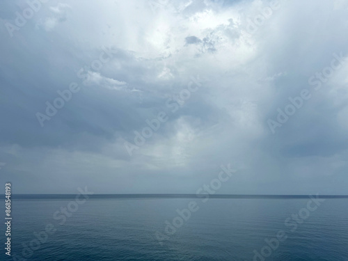 Fototapeta Naklejka Na Ścianę i Meble -  Calm sea in foggy cloudy weather