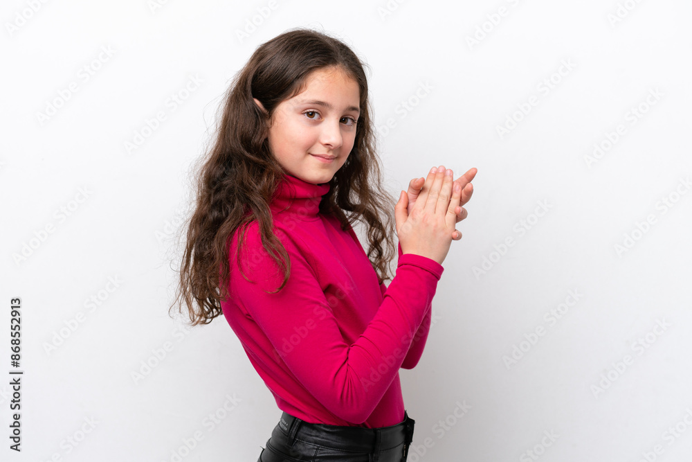 Little girl isolated on white background applauding Little girl isolated on white background applauding