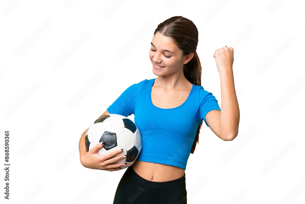 Teenager caucasian girl playing football over isolated background celebrating a victory Teenager caucasian girl playing football over isolated background celebrating a victory