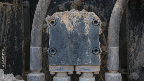 Mechanical parts.  Dirty mechanical components. Parts of an engine that resemble an insect.