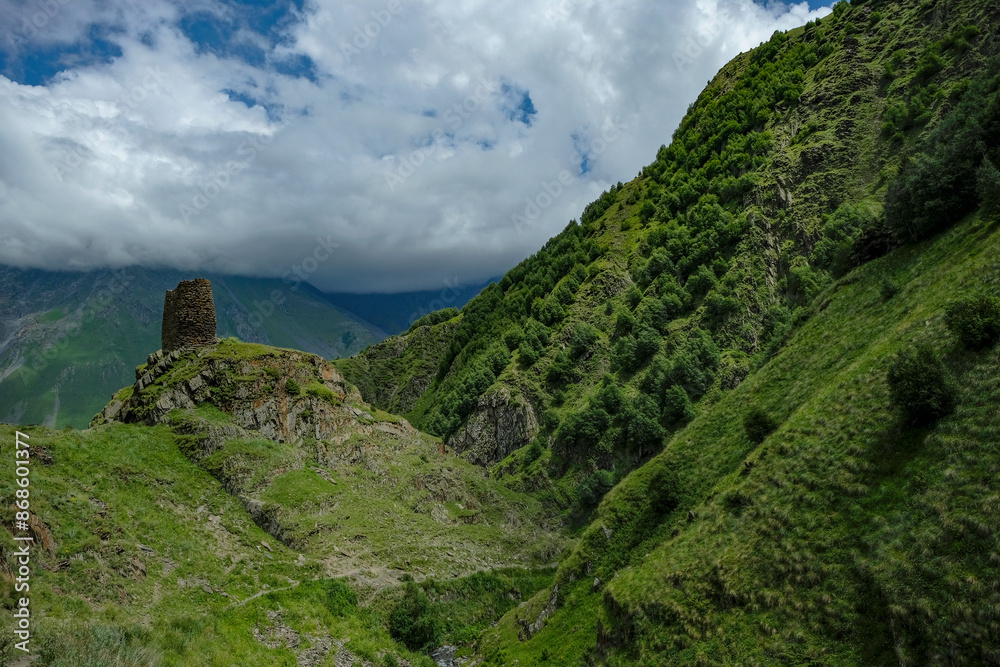 Landscape with the ruins of the Gergeti Tower on Mount Kazbek in Stepantsminda, Georgia. Landscape with the ruins of the Gergeti Tower on Mount Kazbek in Stepantsminda, Georgia.