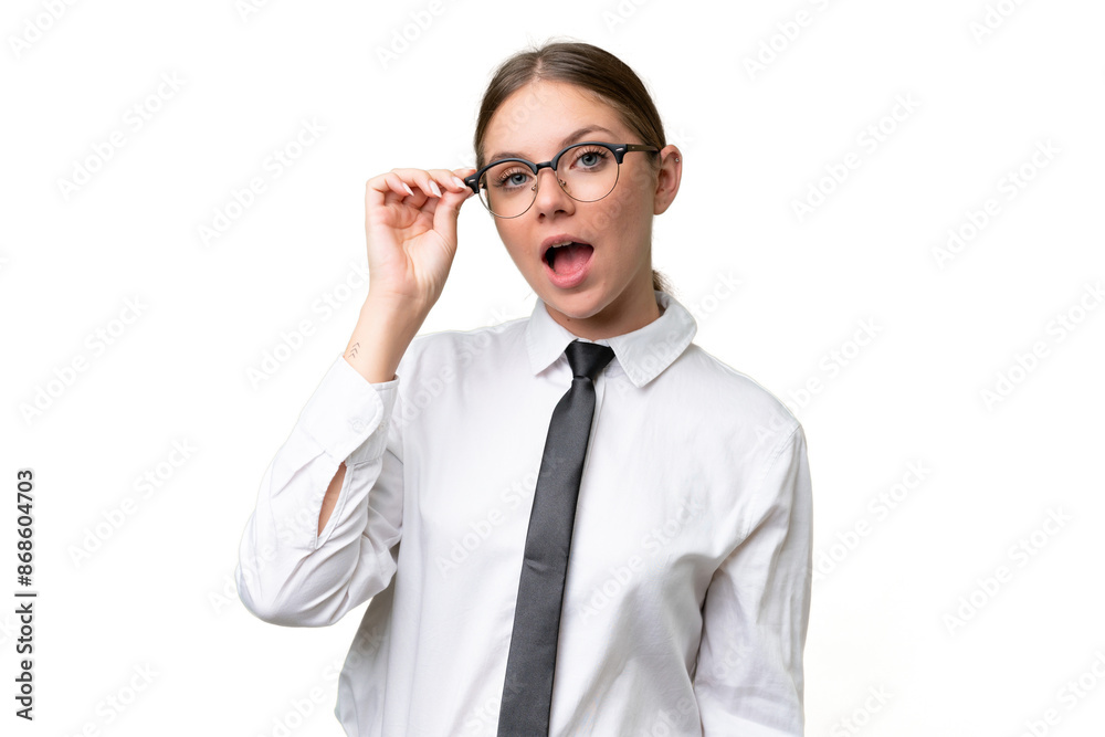 Young business caucasian woman over isolated background with glasses and surprised Young business caucasian woman over isolated background with glasses and surprised