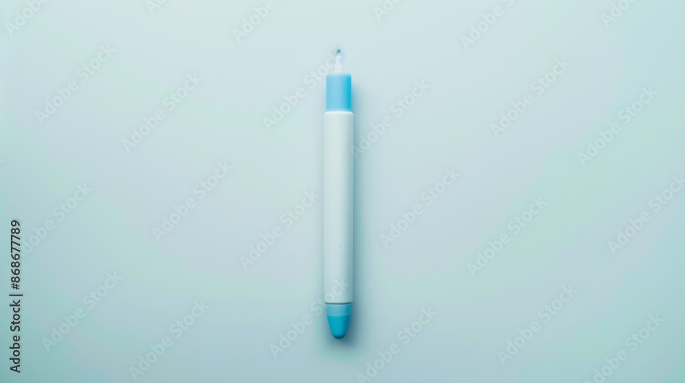 Single Blue and White Pen on Light Blue Background Single Blue and White Pen on Light Blue Background