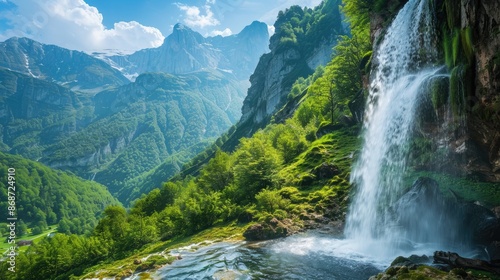 Majestic mountains covered in greenery with a crystal-clear waterfall cascading down.