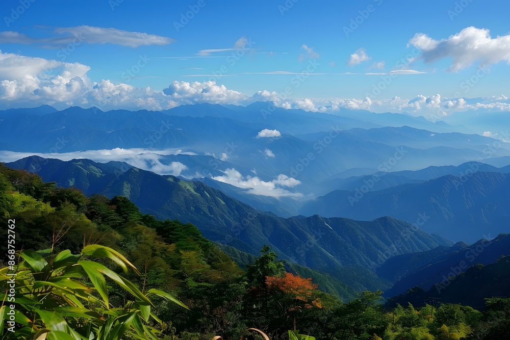 Obraz premium Mountain Range Under Blue Sky With Clouds