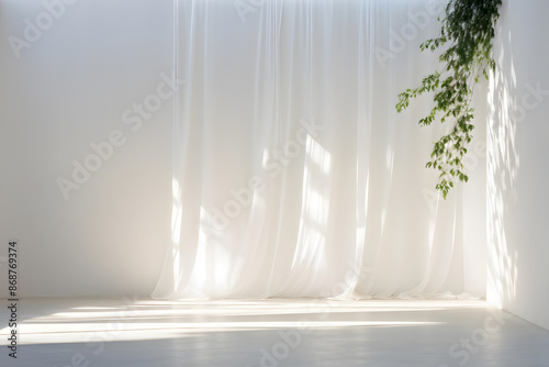 Serene minimalist interior with sunlight casting gentle shadows through white curtains