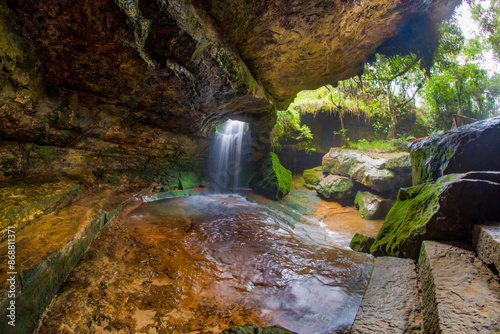 Fototapeta Naklejka Na Ścianę i Meble -  Sum syiem falls cave waterfall near garden of cave at Laitmawsiang Village Meghalaya, India.