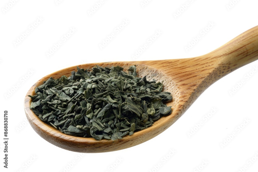 A wooden spoon topped with fresh green leaves, perfect for adding a natural touch to your designs A wooden spoon topped with fresh green leaves, perfect for adding a natural touch to your designs