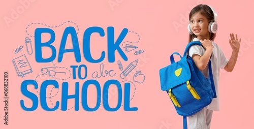 Little girl with backpack a...
