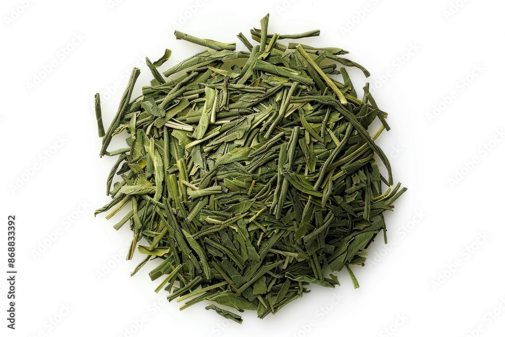A pile of lush green grass on a clean white surface A pile of lush green grass on a clean white surface