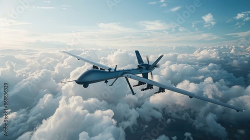 A large military transport plane flying through the clear blue sky