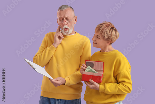 Mature couple with money an...