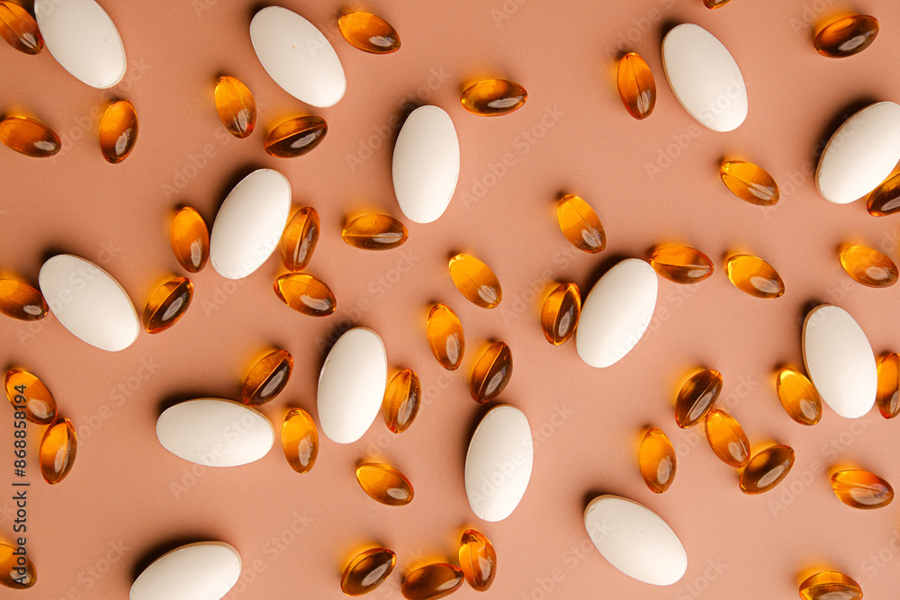 The pattern of vitamin and supplement on biege or neutal background. The pattern of vitamin and supplement on biege or neutal background.