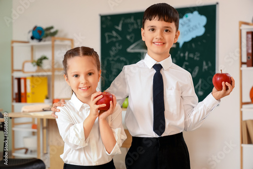 Little schoolchildren with ...