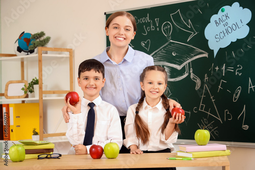 Female teacher and little s...