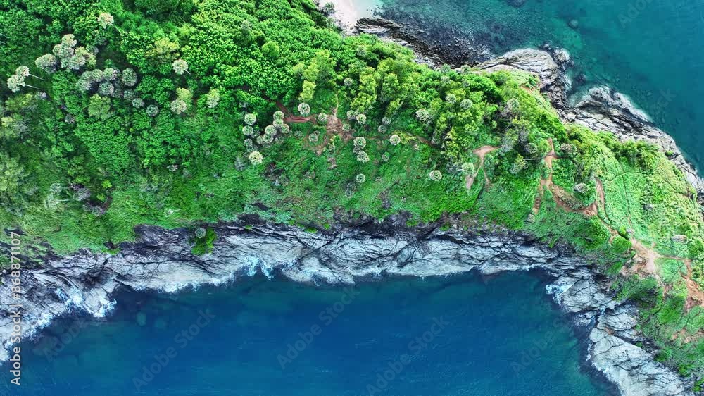 Aerial view seashore cliffs wave crashing on rocks, Beautiful sea surface in sunny day at the phuket island, Phuket Thailand Aerial view seashore cliffs wave crashing on rocks, Beautiful sea surface in sunny day at the phuket island, Phuket Thailand