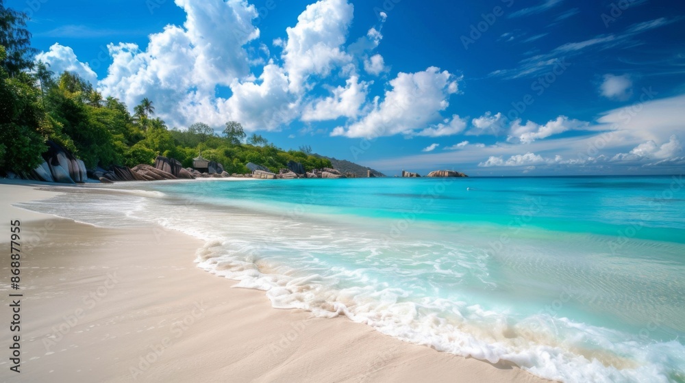 A serene and peaceful image of a sandy beach lined with turquoise waters and clear blue skies, surrounded by lush greenery, perfect for a tranquil escape. A serene and peaceful image of a sandy beach lined with turquoise waters and clear blue skies, surrounded by lush greenery, perfect for a tranquil escape.