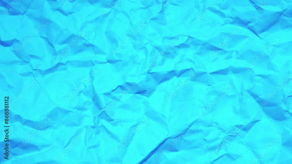 A blue paper with a crumpled texture A blue paper with a crumpled texture