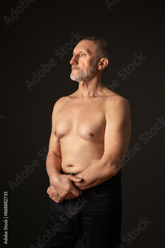 elderly man with a beard, a handsome torso and in good physical shape. Healthy lifestyle. Selective focus © Lema-lisa