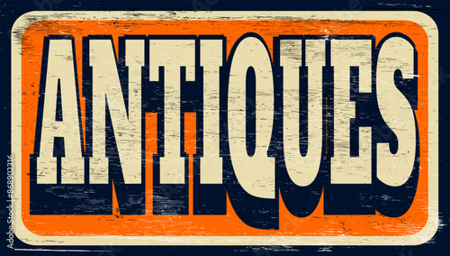 Aged vintage antiques sign on wood