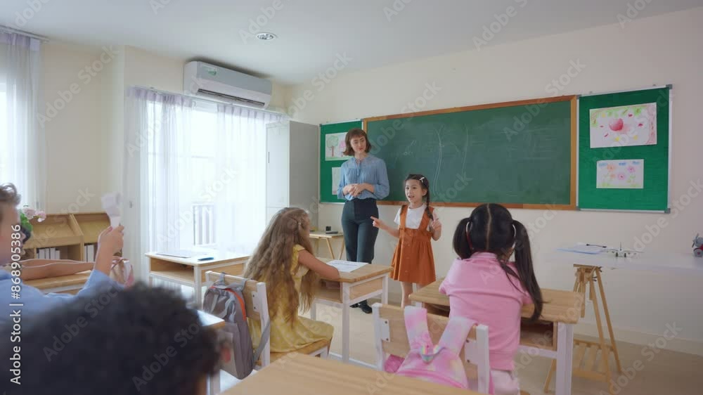 Asian young schoolgirl student dancing in front of classroom at school. Asian young schoolgirl student dancing in front of classroom at school.