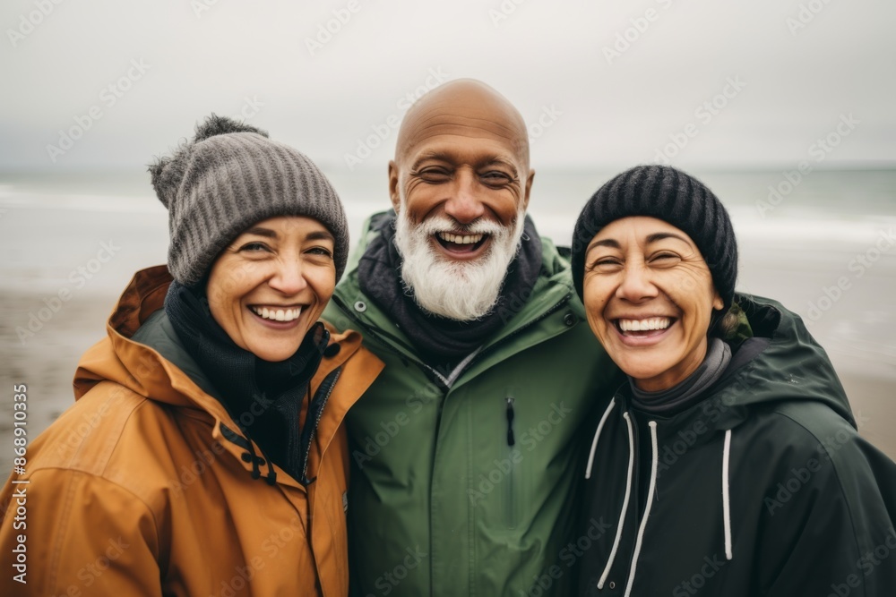 Portrait of a smiling group of senior hikers in rain jackets