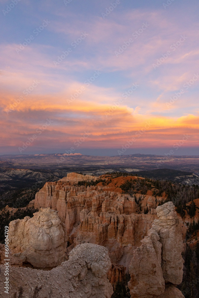 The captivating view of the sunset at Bryce Canyon National Park in Utah showcases vibrant colors and unique rock formations amidst a rugged desert landscape, creating a breathtaking panorama The captivating view of the sunset at Bryce Canyon National Park in Utah showcases vibrant colors and unique rock formations amidst a rugged desert landscape, creating a breathtaking panorama