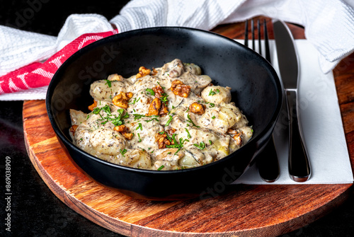 A serving of Potato Gnocchi in a creamy sauce