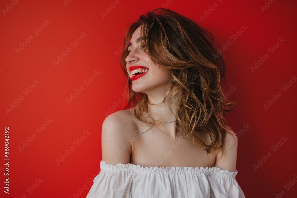 Portrait of beautiful caucasian woman laughing and looking away isolated on red background Portrait of beautiful caucasian woman laughing and looking away isolated on red background