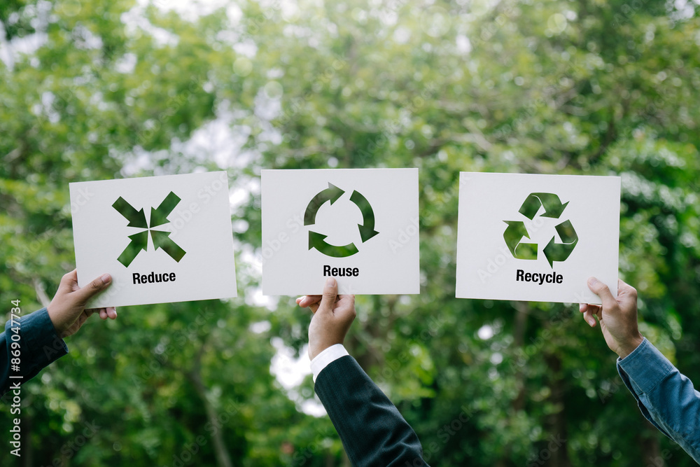 Businessman hand holding paper with Reduce, Reuse, Recycle symbol ...