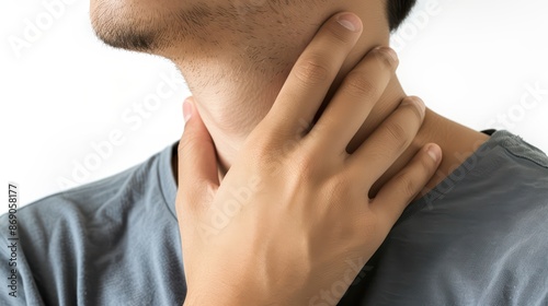 A man with a sore throat. touching their neck and looking uncomfortable. on white background. with white space