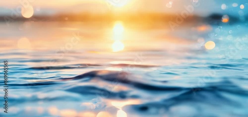 Blurred blue sea water with sunlight and bokeh background