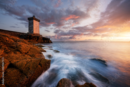 Fantastic view of Kermorvan lighthouse taken at sunset, Brittany, France photo