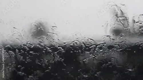 foottage ambience of rainy thunder from inside a car