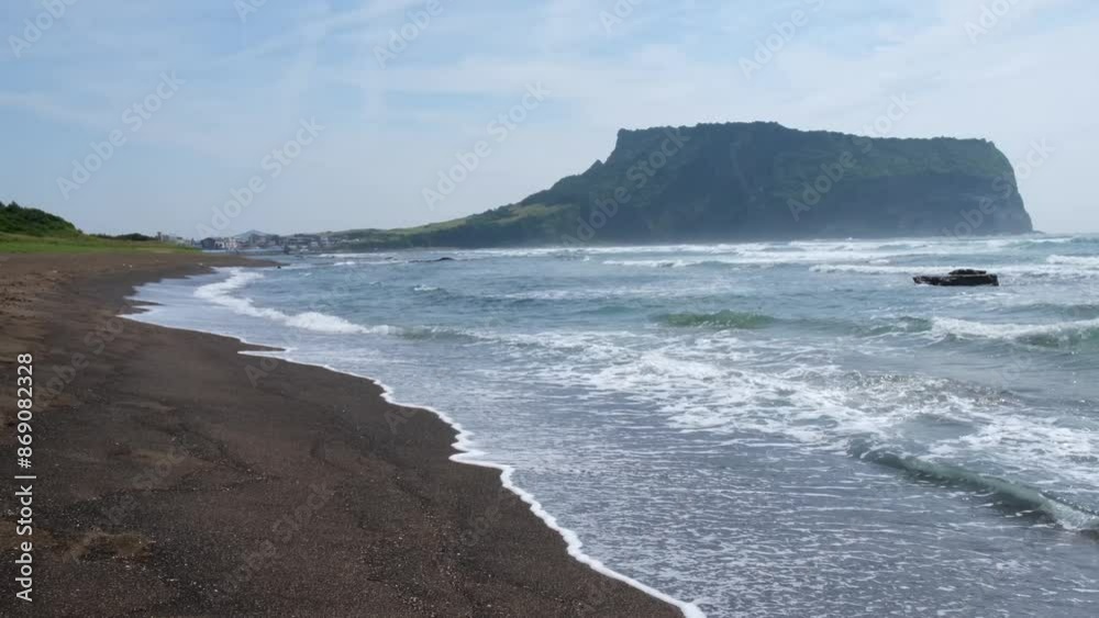 Sea coast landscape. Waves on rocky and sand beach. Jeju island, Korea Sea coast landscape. Waves on rocky and sand beach. Jeju island, Korea