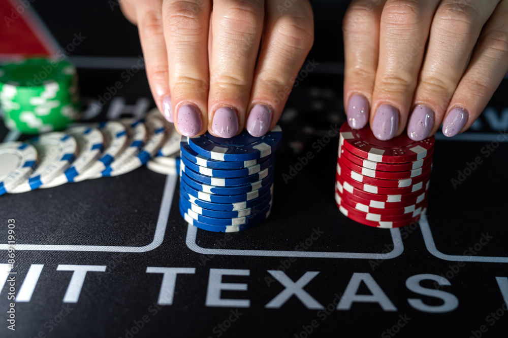 woamn play at casino and take chips for makes bet. Entertainment concept woamn play at casino and take chips for makes bet. Entertainment concept