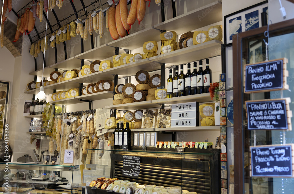 Fototapeta premium A shop selling local and typical italian produce in the historic center of San Gimignano, Tuscany.