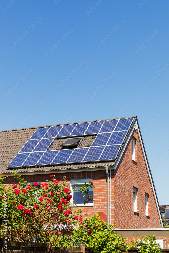 Germany,North Rhine Westphalia, Cologne, Modern suburban house with rooftop solar panels
