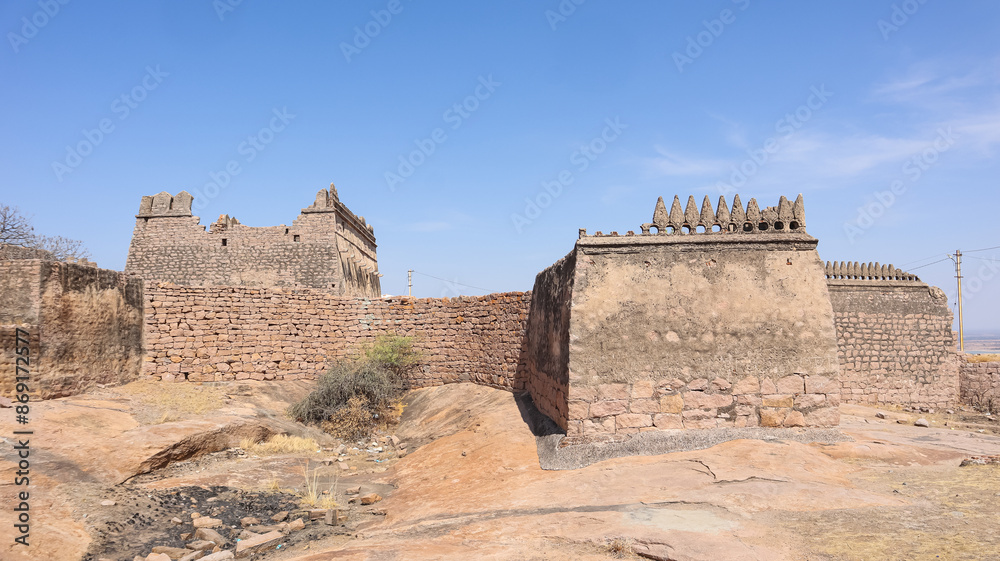 Ruined fort walls on top of Madakasira Fort, Penukonda, Andhra Pradesh, India. Ruined fort walls on top of Madakasira Fort, Penukonda, Andhra Pradesh, India.