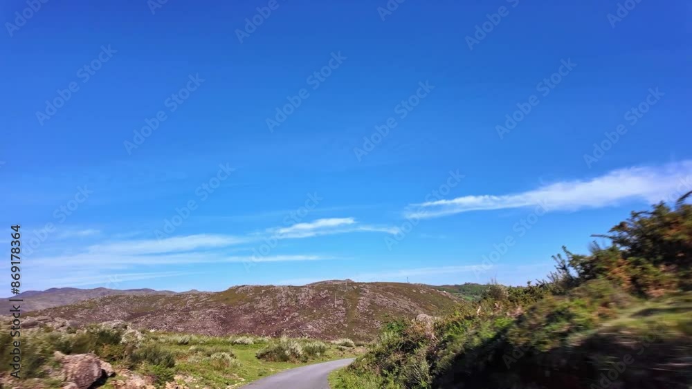 Driving with the car through the Peneda Geres National Park in Portugal, Europe. Area around Ponte da Barca Driving with the car through the Peneda Geres National Park in Portugal, Europe. Area around Ponte da Barca