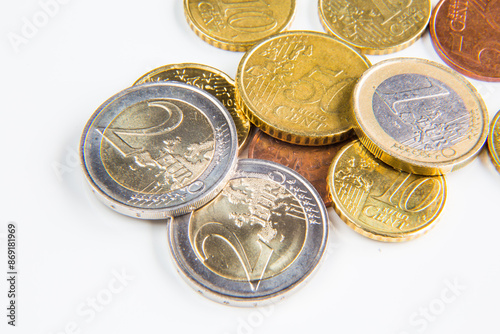 Different euro coins on white background