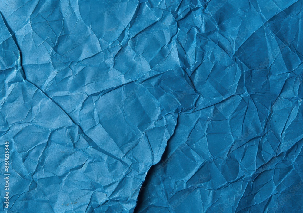 Obraz premium crumpled blue paper texture