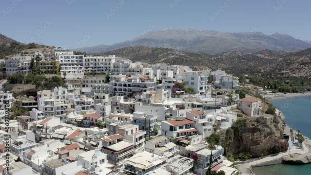 A drone's eye view of Agia Galini's harbor and southern coast in Crete A drone's eye view of Agia Galini's harbor and southern coast in Crete