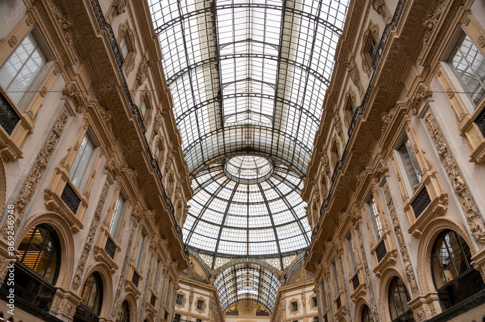 Galleria Vittorio Emanuele II showing its ornate iron and glass roof in Milan, Italy Galleria Vittorio Emanuele II showing its ornate iron and glass roof in Milan, Italy