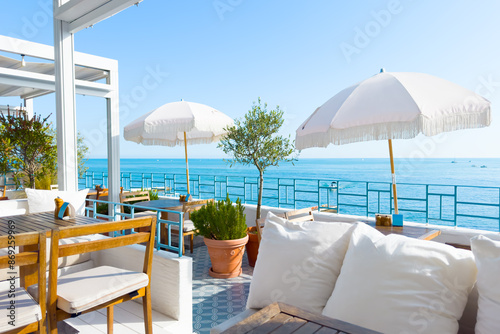 Obraz na płótnie Beautiful terrace with sea view at sunny day. Travel and summer vacation concept. w salonie