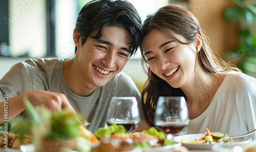 couple happily enjoying a meal together at home, white clean modern living room.Generative AI
