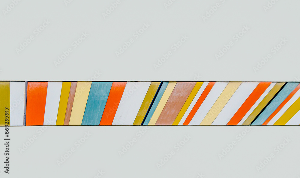Obraz premium white wall with multicolored rainbow stripes