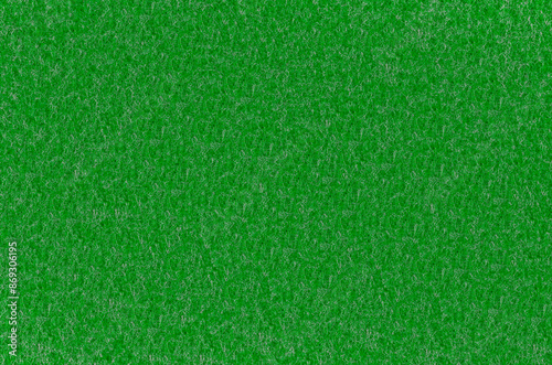 A surface made of green wool felt fabric, carpet, raw fabric with micro details, photographed from above top, used for background wrapping 3D models, free space for text. Handmade, designed textile