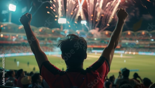 Fan Celebrating a Point in a Cricket Match